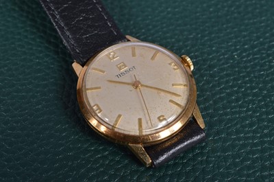 Lot 165 - A c1960s Tissot manual wind gold cased wristwatch