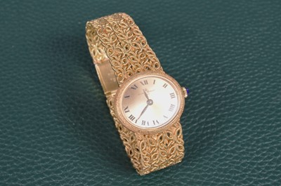 Lot 173 - A c1970s Baume & Mercier manual wind 18ct gold lady's cocktail dress wristwatch
