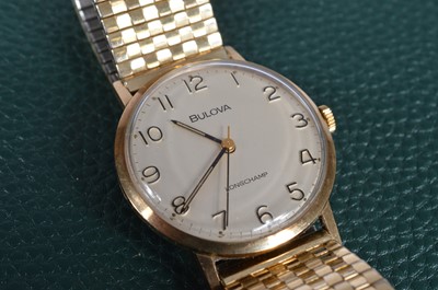 Lot 181 - A 1970s Bulova Longchamp manual wind 9ct gold cased wristwatch head