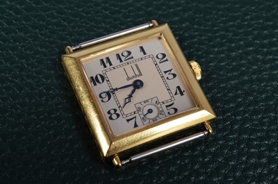 Lot 210 - An early 20th century Dunhill manual wind limited edition 18ct gold cased wristwatch head