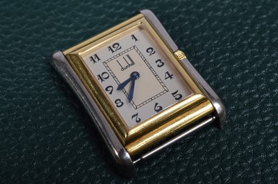 Lot 215 - An early 20th century Dunhill manual wind limited edition two tone 18ct gold cased wristwatch head