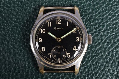 Lot 244 - A WWII period Grana manual wind military issue chromed wristwatch head