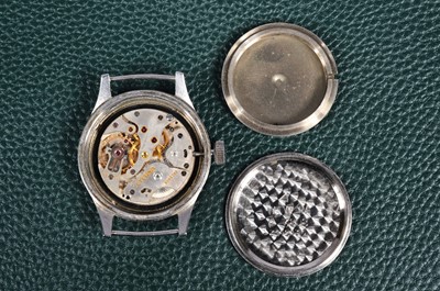 Lot 247 - A WWII period Eterna manual wind military issue "Dirty Dozen" stainless steel wristwatch head