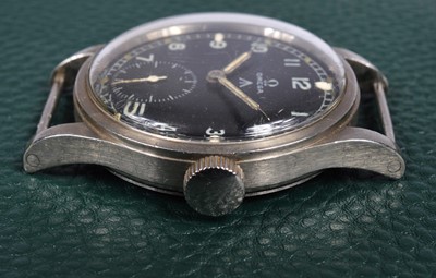Lot 248 - A WWII period Omega manual wind military issue "Dirty Dozen" stainless steel wristwatch head
