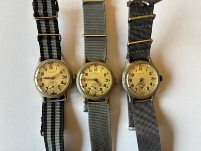 Lot 263 - Three Timor manual wind military issue chromed wristwatches