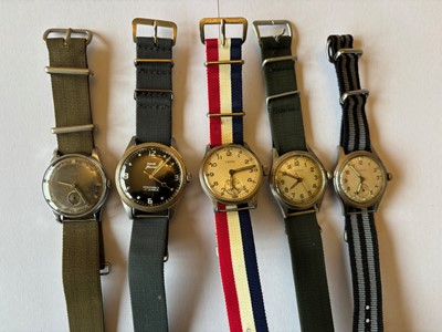 Lot 268 - Five mid 20th century and later manual wind military style wristwatches