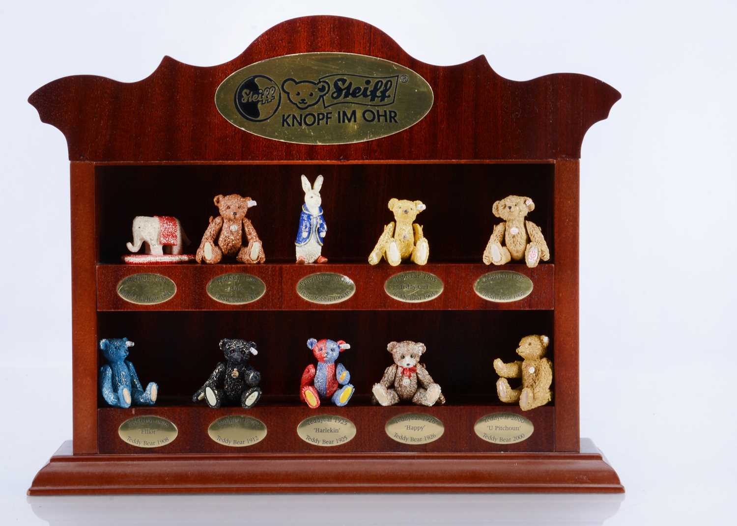 Lot 29 - A complete set of ten Steiff pewter miniatures, in wooden display case