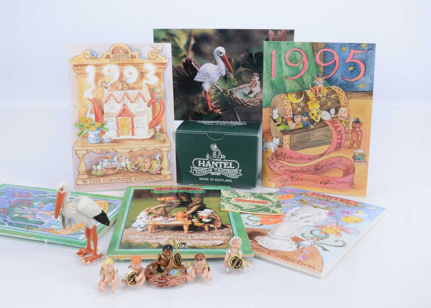 Lot 40 - A Hantel Miniatures stork baby and nest set