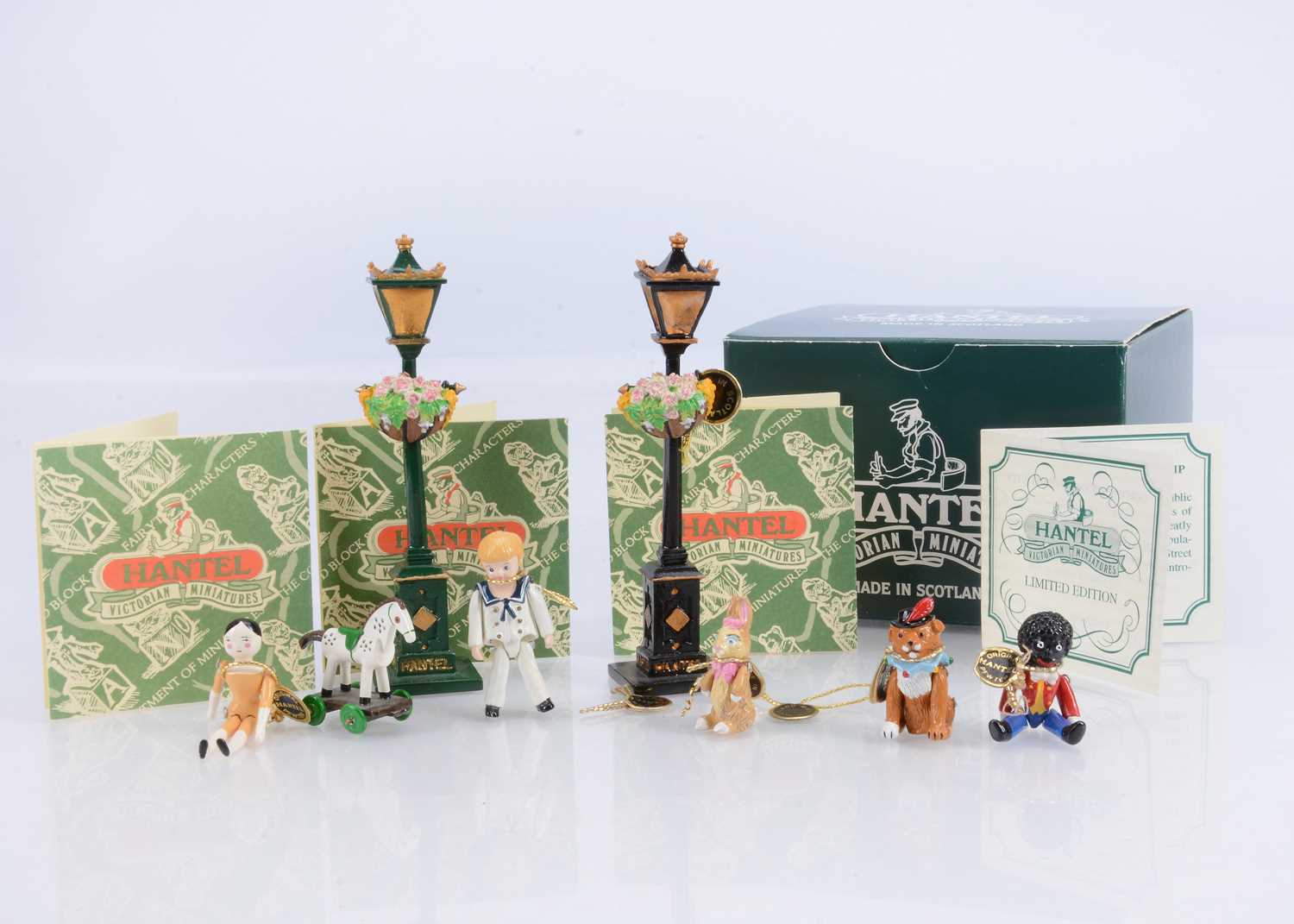 Lot 41 - Six Hantel Miniatures childhood toys