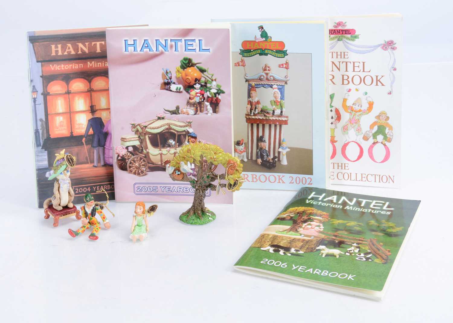 Lot 44 - Four Hantel Miniatures