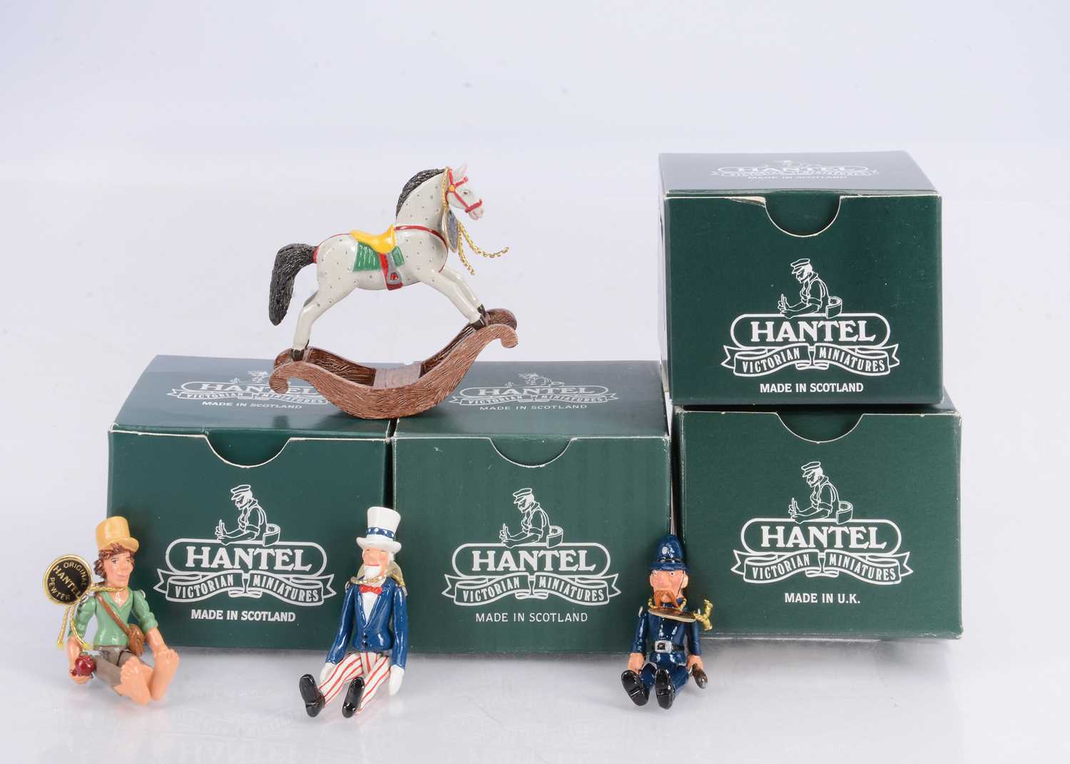 Lot 47 - Four Hantel Miniatures