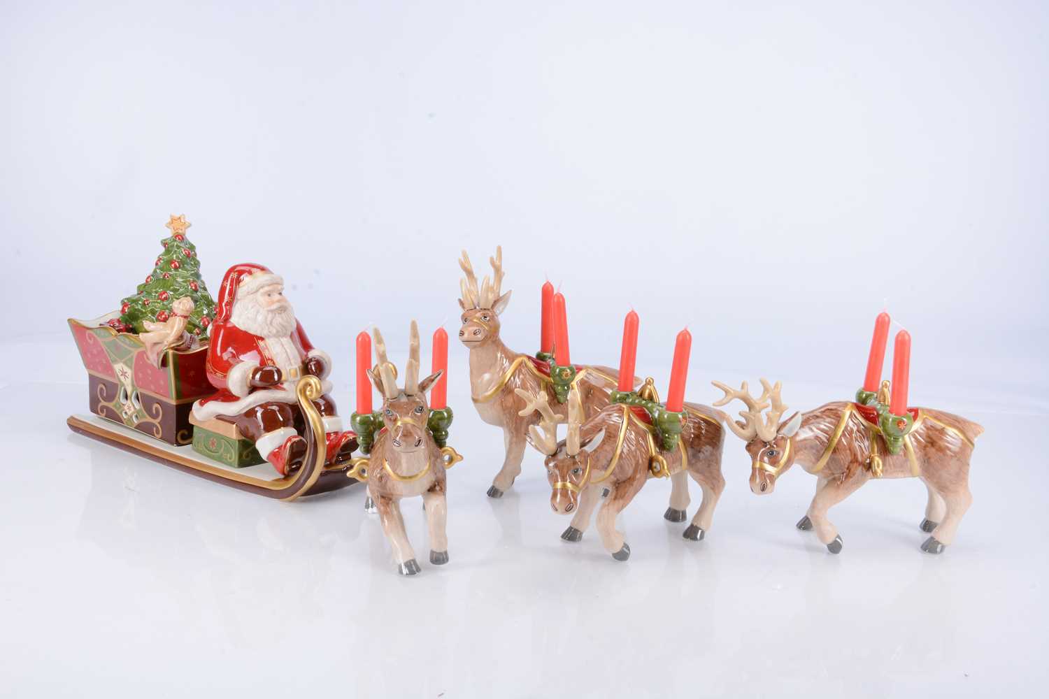 Lot 62 - A Villeroy & Boch Santa Claus and Sleigh porcelain Christmas music box ornament