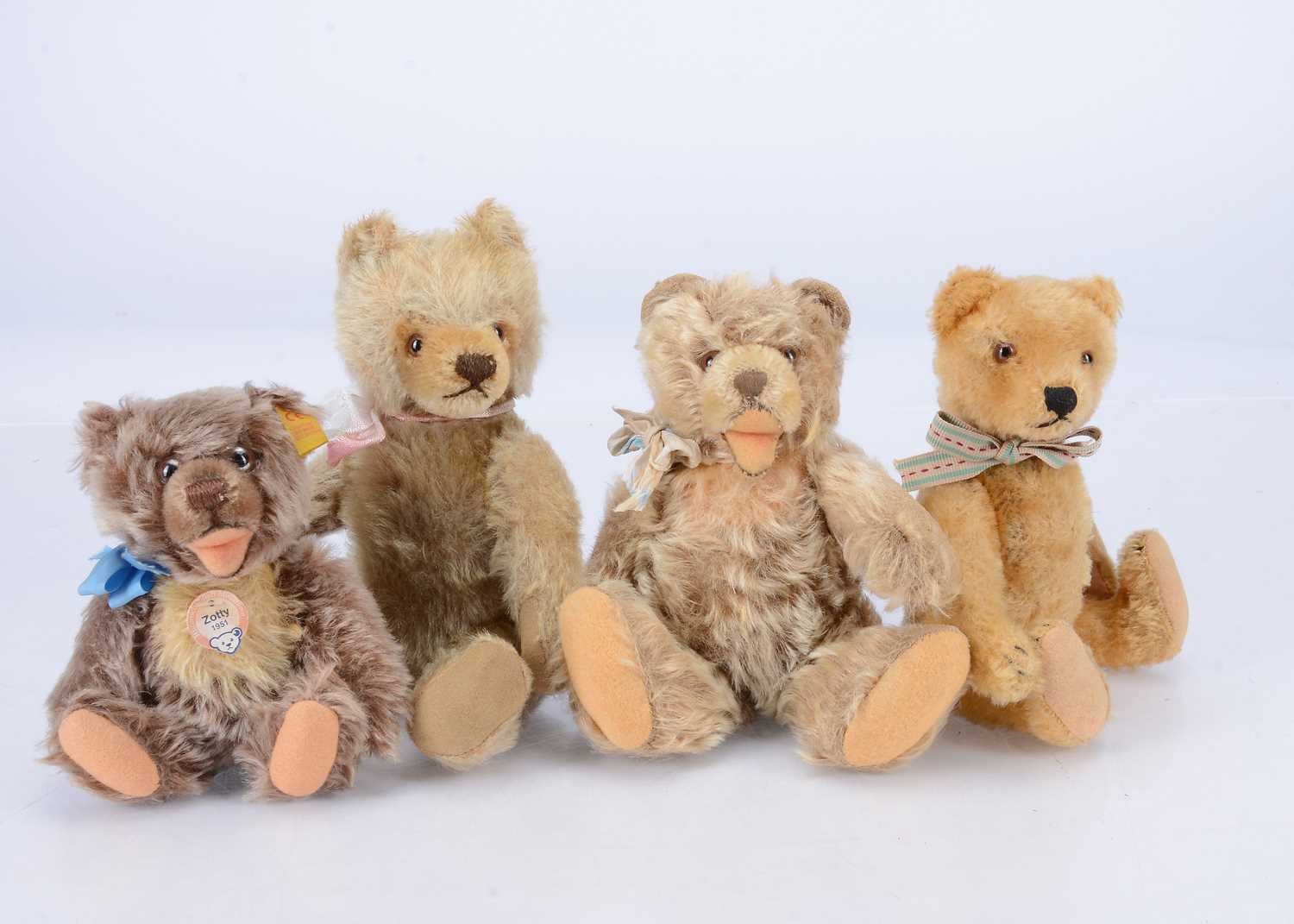 Lot 96 - Four small post-war Steiff teddy bears