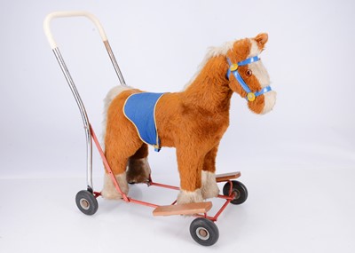 Lot 118 - Two post-war toy horses