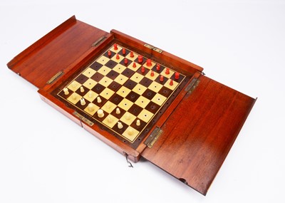 Lot 138 - A late 19th century English travelling chess set