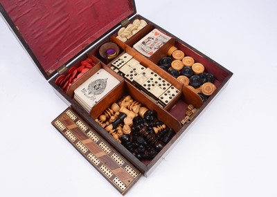 Lot 140 - A late 19th century chessboard wooden games box