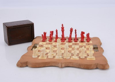 Lot 143 - A small 19th century travelling bone chess set