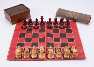 Lot 144 - An early 20th century vegetable ivory chess set