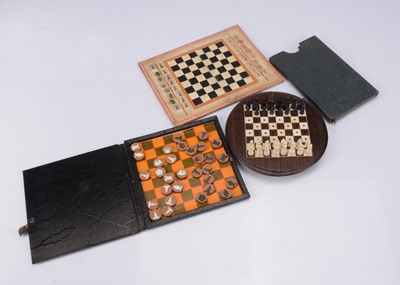 Lot 151 - Three travelling chess sets