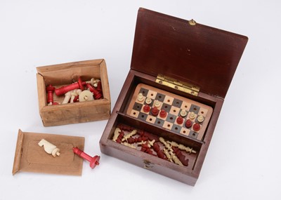 Lot 152 - Two bone travelling chess sets