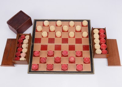 Lot 161 - Three bone draught sets