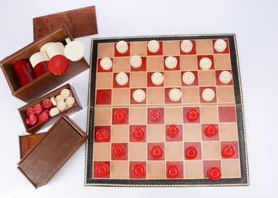 Lot 163 - Three sets of thirty piece draughts