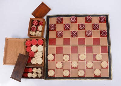 Lot 164 - Three sets of eighteen piece draughts