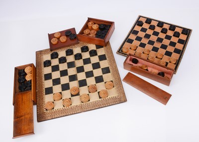Lot 165 - Three sets of turned wood draughts