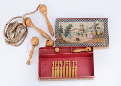 Lot 198 - A mid 19th century box of turned wooden toys