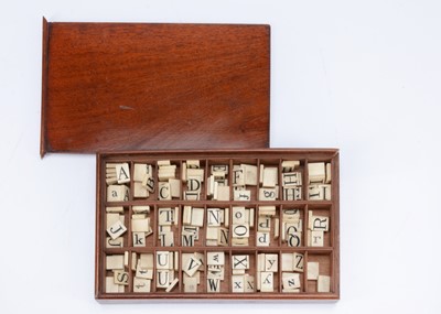 Lot 210 - An 19th century bone alphabet boxed set