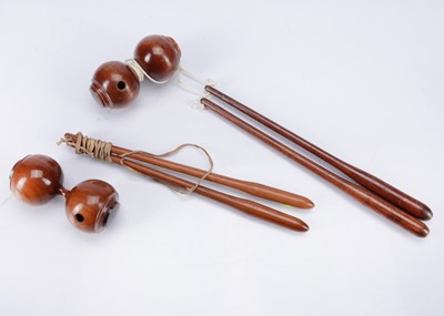 Lot 286 - Two similar late 19th century treen whistling diablo