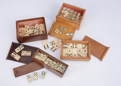 Lot 302 - Four small bone domino sets