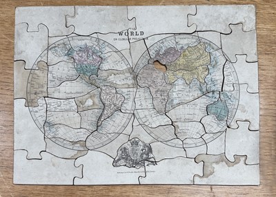 Lot 323 - A mid 19th century G. F. Cruchley ‘The World on Globular Projection’ dissected puzzle