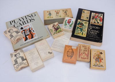 Lot 388 - Reproduction playing cards and reference books