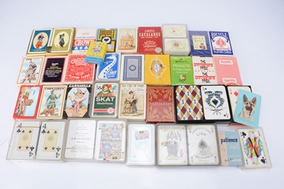 Lot 390 - Thirty-two packs of boxed playing cards