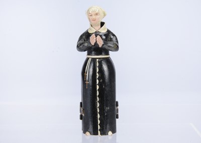 Lot 401 - A mid 19th century Oberammergau wooden figure of a nun with hidden chapel in robes