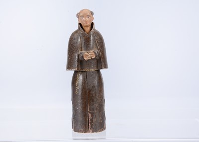 Lot 402 - An early to mid 19th century Oberammergau wooden figure of a monk with hidden chapel in robes