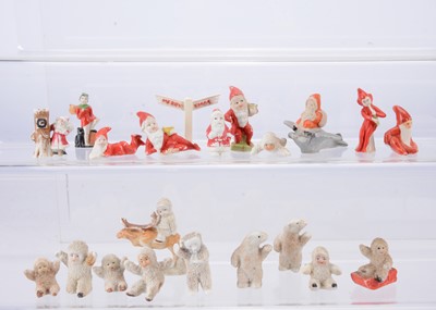 Lot 416 - Bisque Christmas cake decorations
