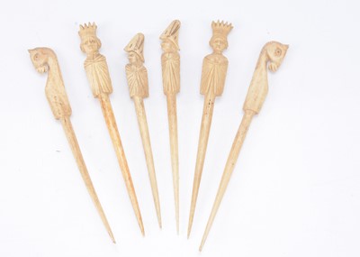 Lot 443 - Six 19th century French carved bone gaming pieces