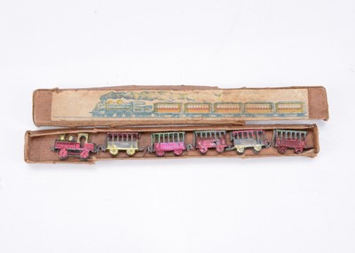 Lot 446 - A Japanese diecast Penny Toy miniature or dolls’ house train set