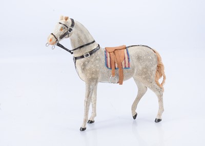 Lot 456 - An early 20th century composition horse candy container