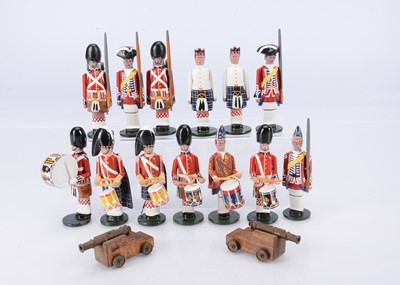 Lot 458 - Thirteen hand-made carved wooden soldiers made by R & M Kirby