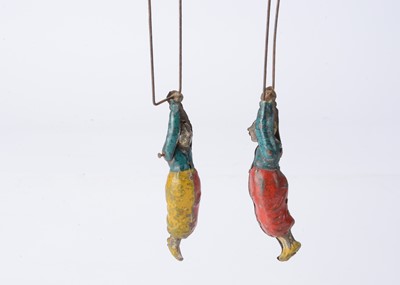 Lot 463 - Two tinplate clown acrobats
