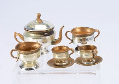 Lot 474 - A German mercury glass dolls’ house tea for two, probably early 20th century