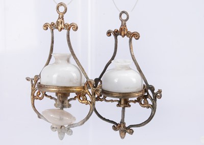 Lot 486 - A pair of late 19th century German soft-metal dolls’ house ceiling oil lamps