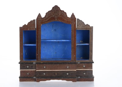 Lot 497 - A rare mid 19th century Waltershausen dolls’ house breakfront bookcase