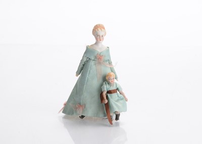 Lot 502 - A small German bisque shoulder-head dolls’ house doll