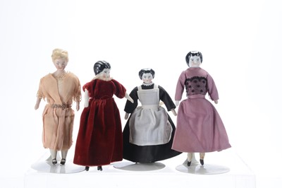 Lot 507 - Four shoulder-head dolls’ house dolls