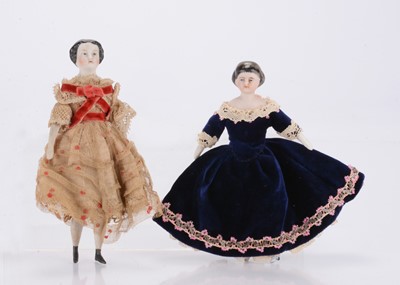 Lot 516 - Two 19th century bisque shoulder-head dolls’ house dolls