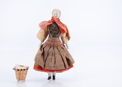 Lot 521 - A fine 19th century large scale bisque shoulder-head dolls’ house doll